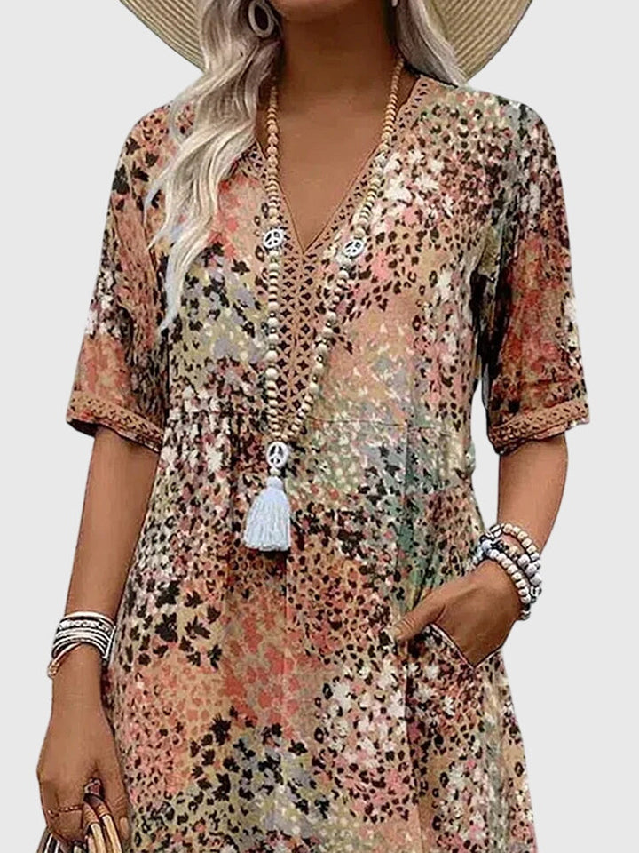 Bella | Robe midi élégante à fleurs