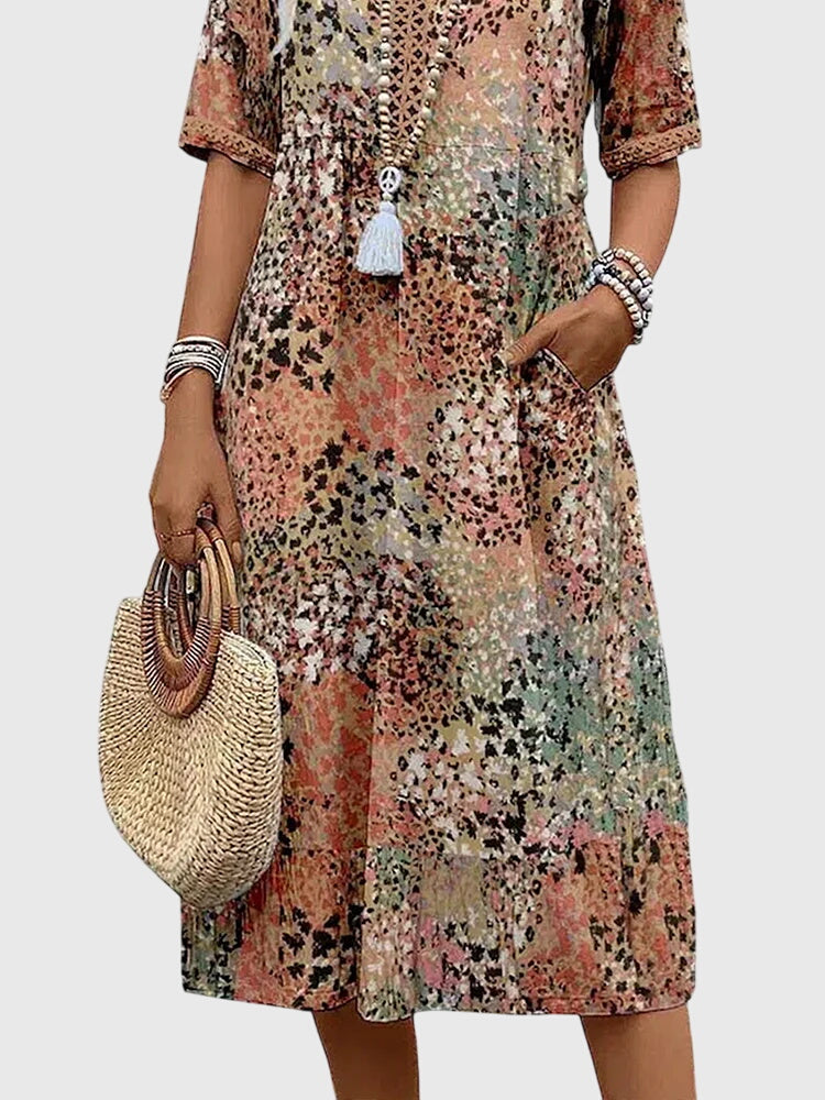 Bella | Robe midi élégante à fleurs