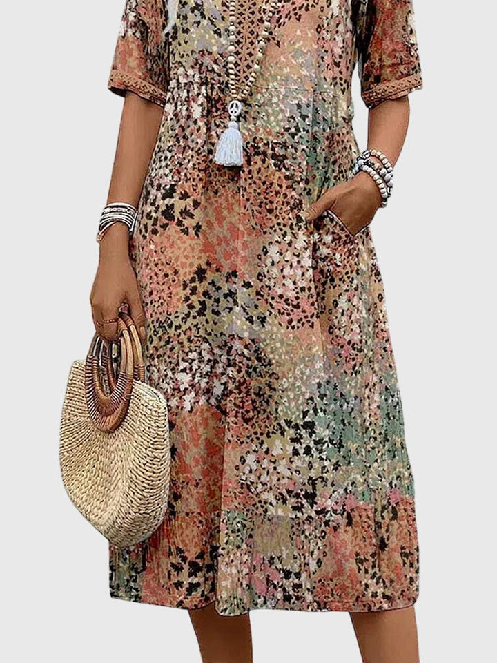 Bella | Robe midi élégante à fleurs